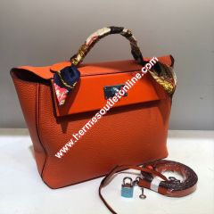 Hermes Taurillon Maurice Bag Calfskin Palladium Hardware In Orange